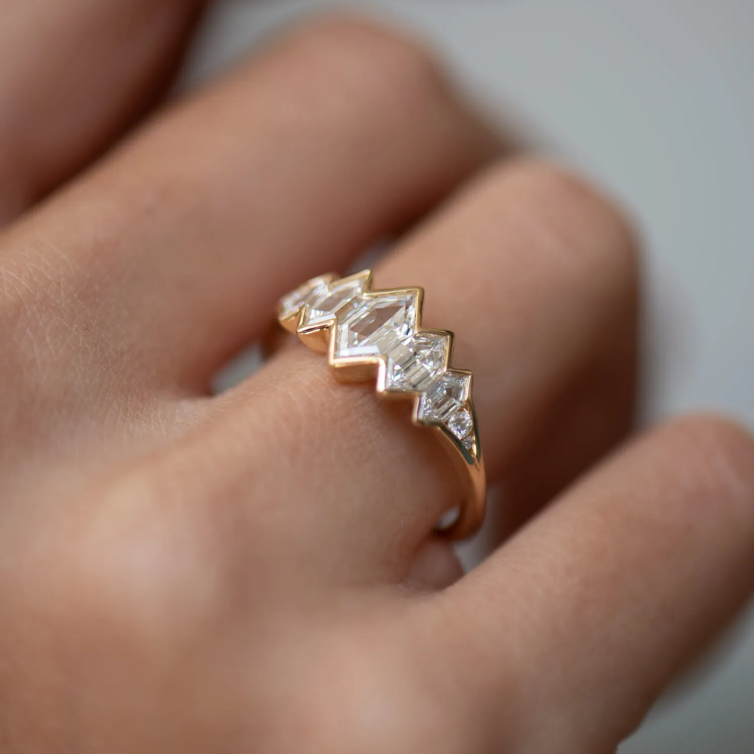 Mountain Lake Engagement Ring with Hexagon Cut Diamonds and a Golden Bezel